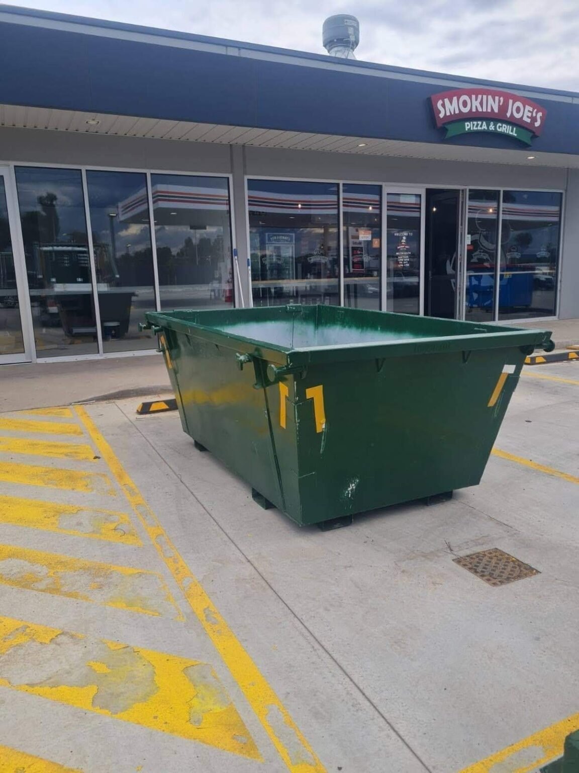 Skip-Bin-Placed-in-front-of-commercial-1152x1536